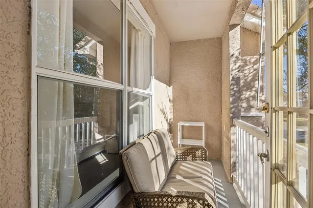 a view of a house with swimming pool patio and swimming pool