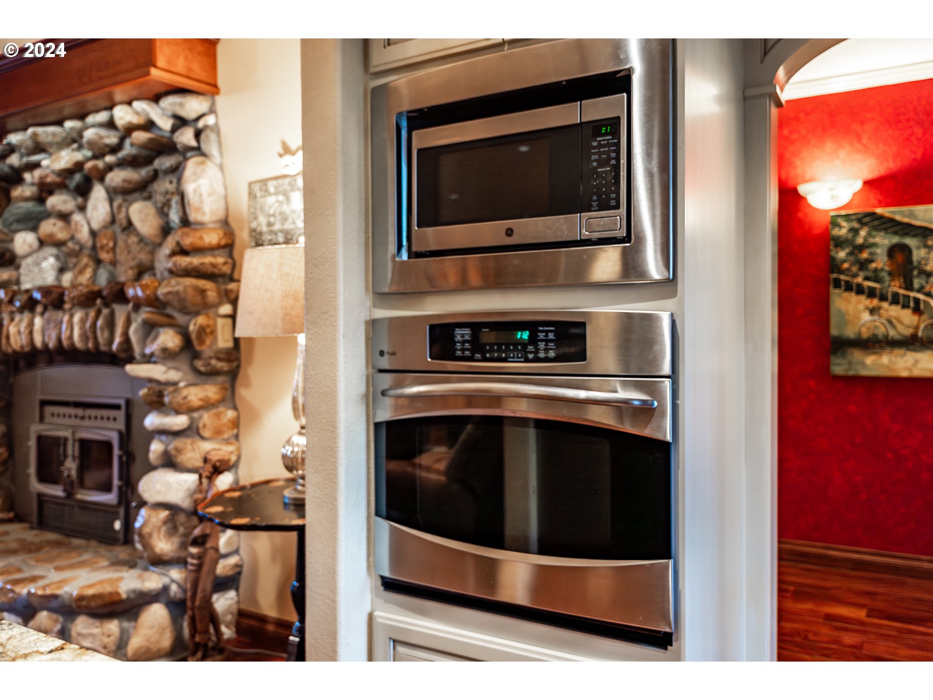 417 Elgarose Road Roseburg, OR 97471 - Photo 15 of 44 a kitchen with a stove and a microwave