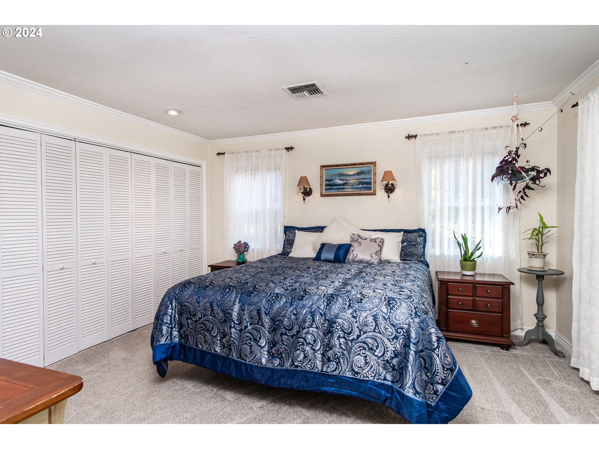 417 Elgarose Road Roseburg, OR 97471 - Photo 16 of 44 a bedroom with a bed and a couch
