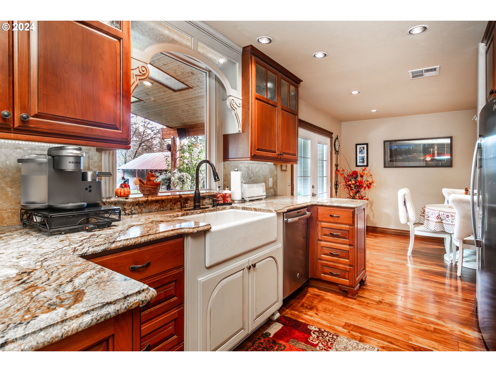 417 Elgarose Road Roseburg, OR 97471 - Photo 2 of 44 a kitchen with stainless steel appliances granite countertop a sink and cabinets