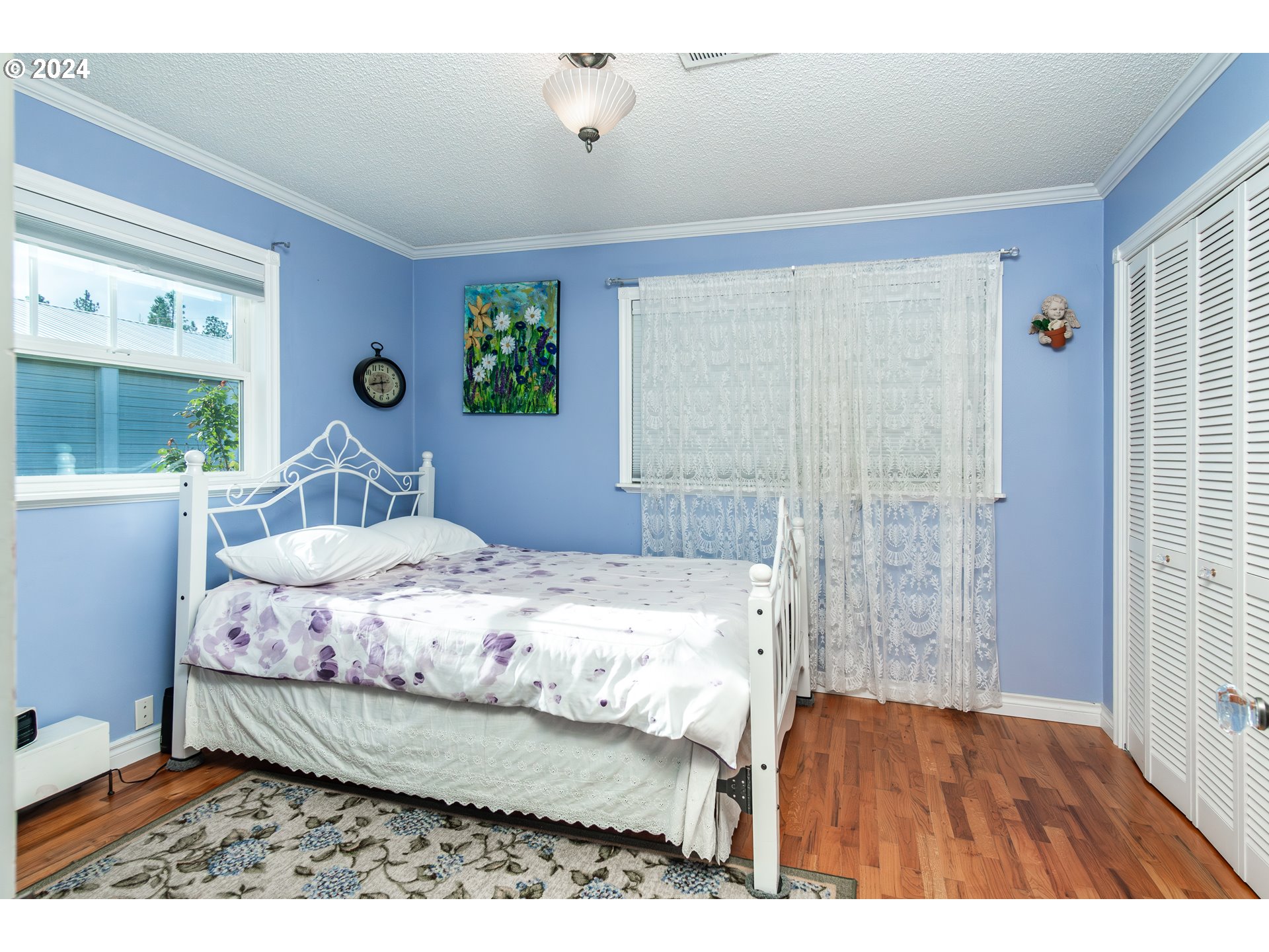 417 Elgarose Road Roseburg, OR 97471 - Photo 22 of 44 a bedroom with a bed and a window