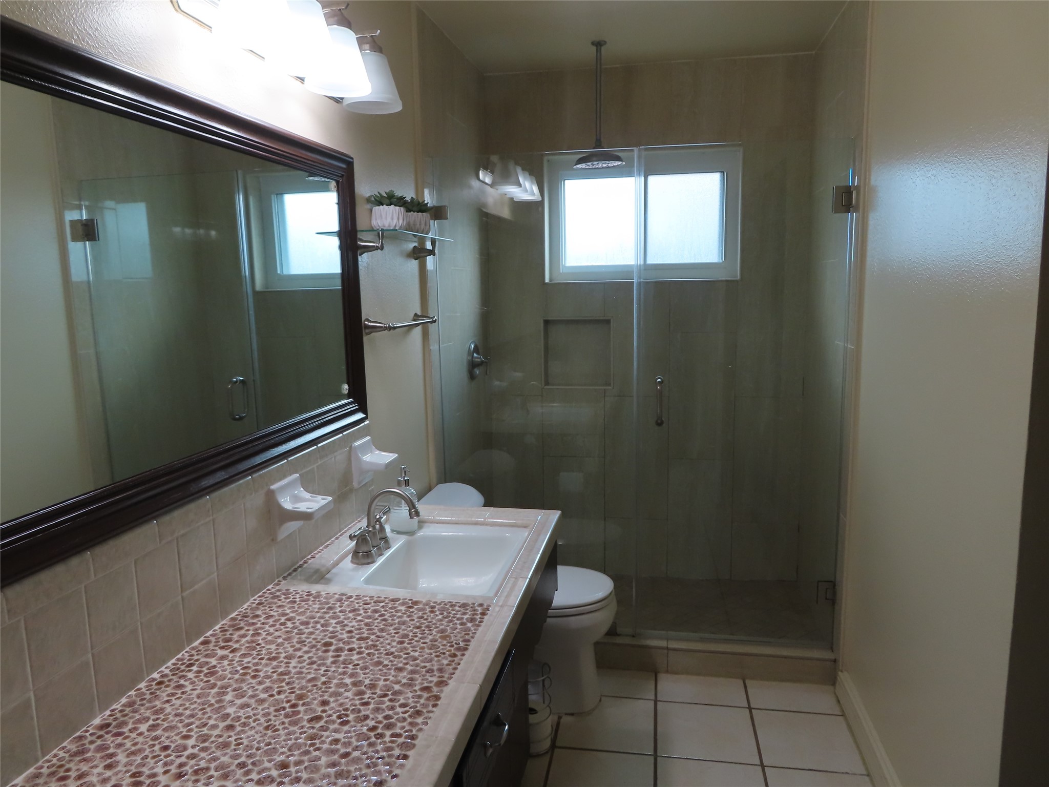 14207 Foxford Way Houston, TX 77015 - Photo 13 of 24 Updated shower in the 2nd bathroom