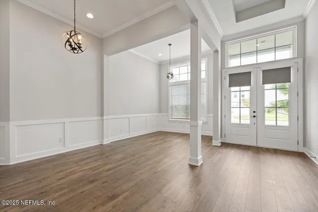 a view of a kitchen cabinets and a window