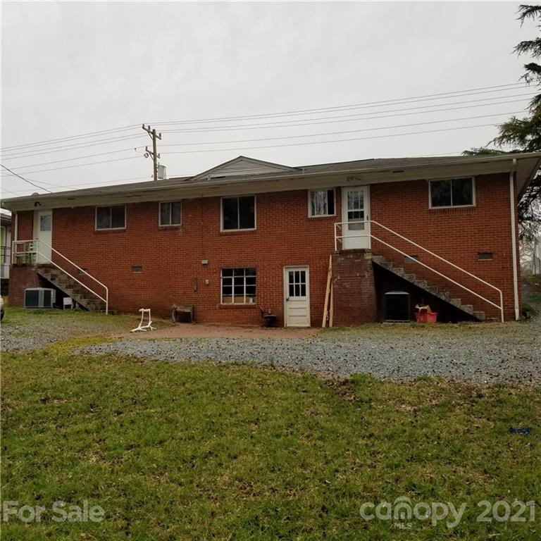2128 North Sharon Amity Road Charlotte, NC 28212 - Photo 2 of 15 a house view with a backyard space