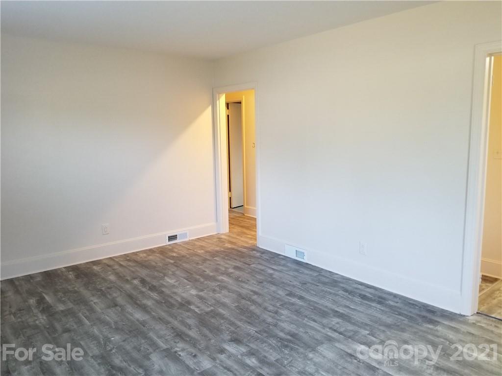 2128 North Sharon Amity Road Charlotte, NC 28212 - Photo 4 of 15 a view of an empty room