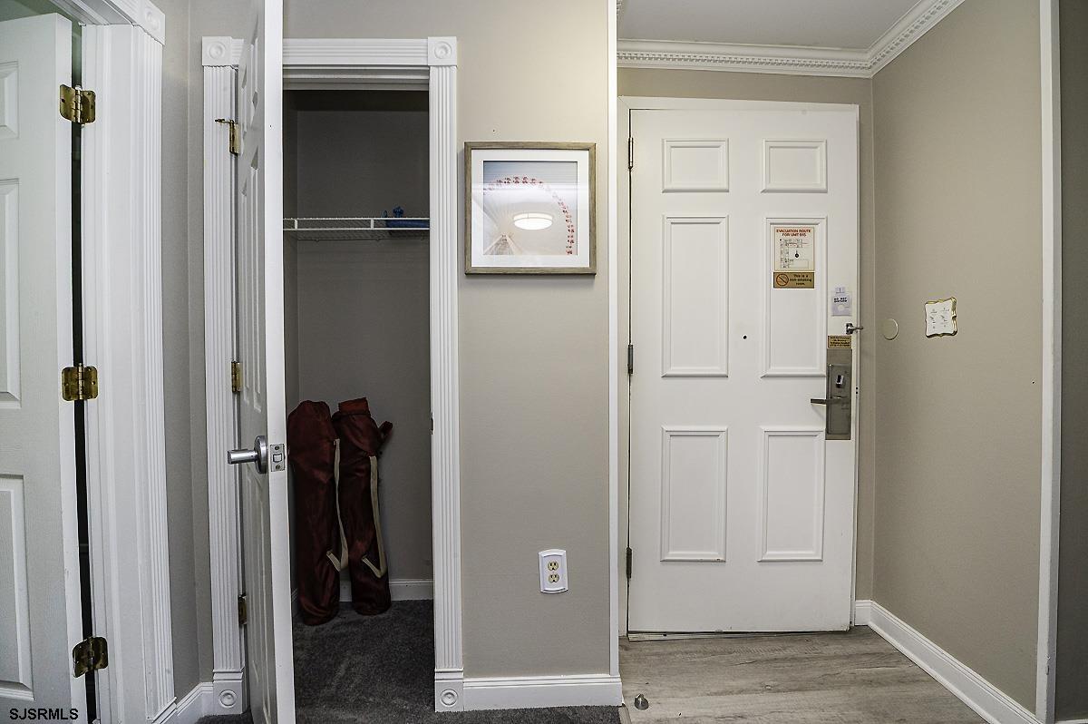 719 East 11th Street, Unit 915 Ocean City, NJ 08226 - Photo 11 of 27 a view of a hallway with closet and front door