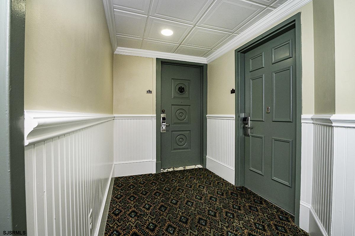 719 East 11th Street, Unit 915 Ocean City, NJ 08226 - Photo 20 of 27 a bathroom with a glass door shower