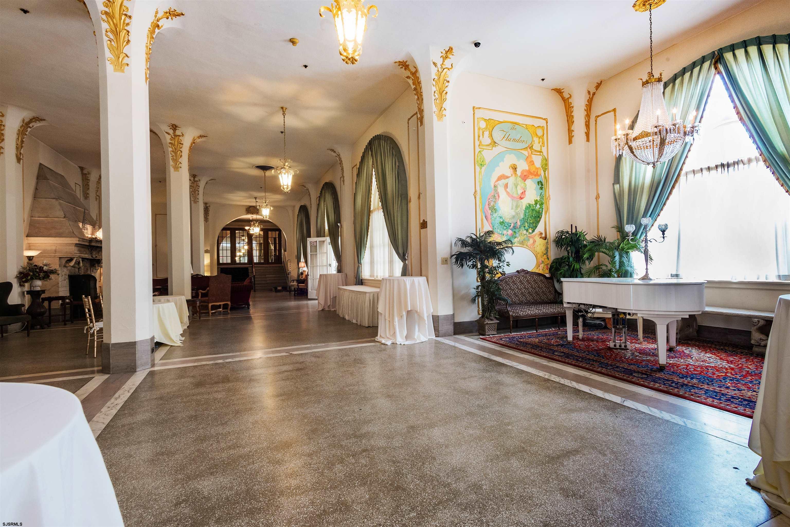 719 East 11th Street, Unit 915 Ocean City, NJ 08226 - Photo 25 of 27 a living room filled with furniture