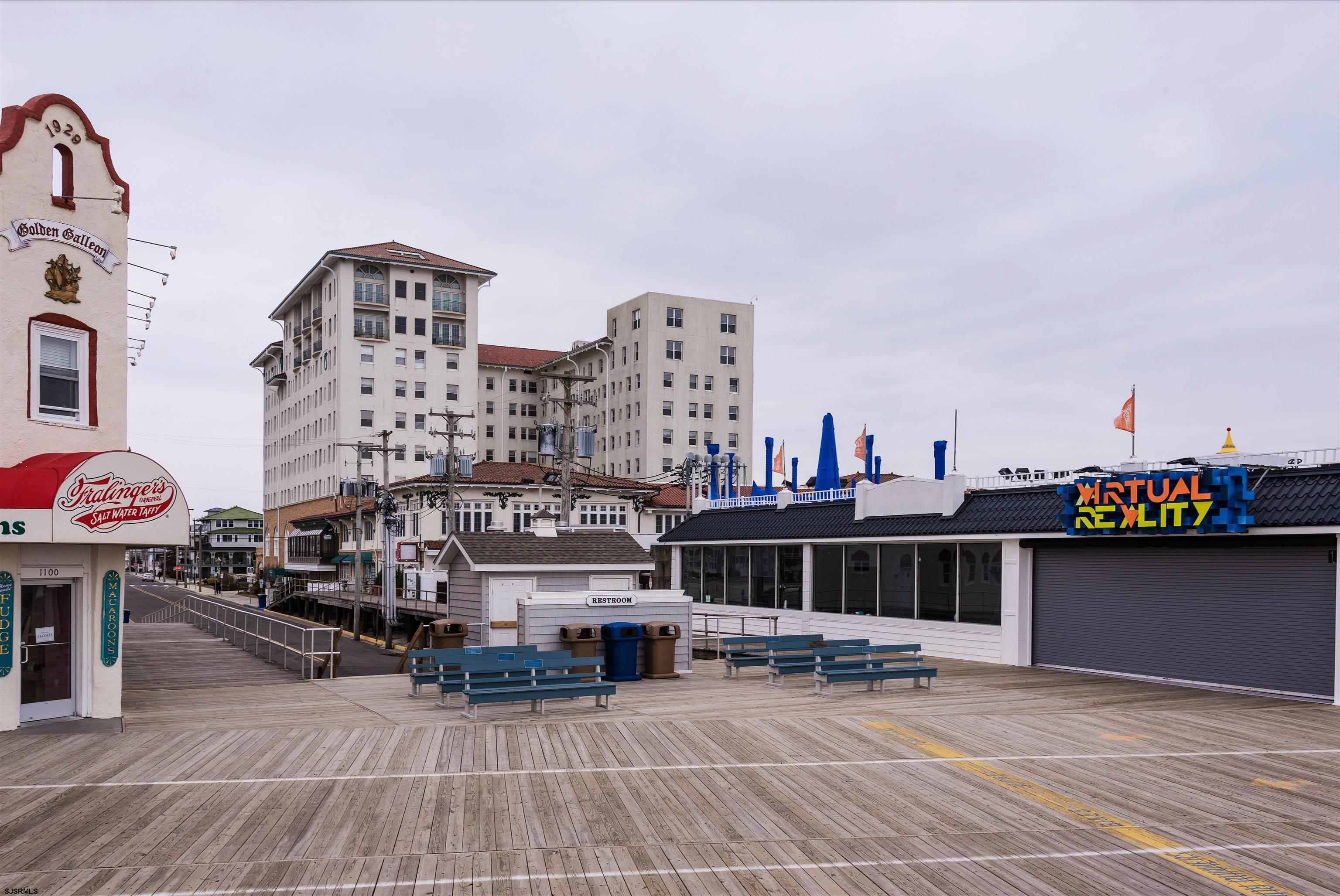 719 East 11th Street, Unit 915 Ocean City, NJ 08226 - Photo 26 of 27 a view of a balcony with chairs and iron stairs