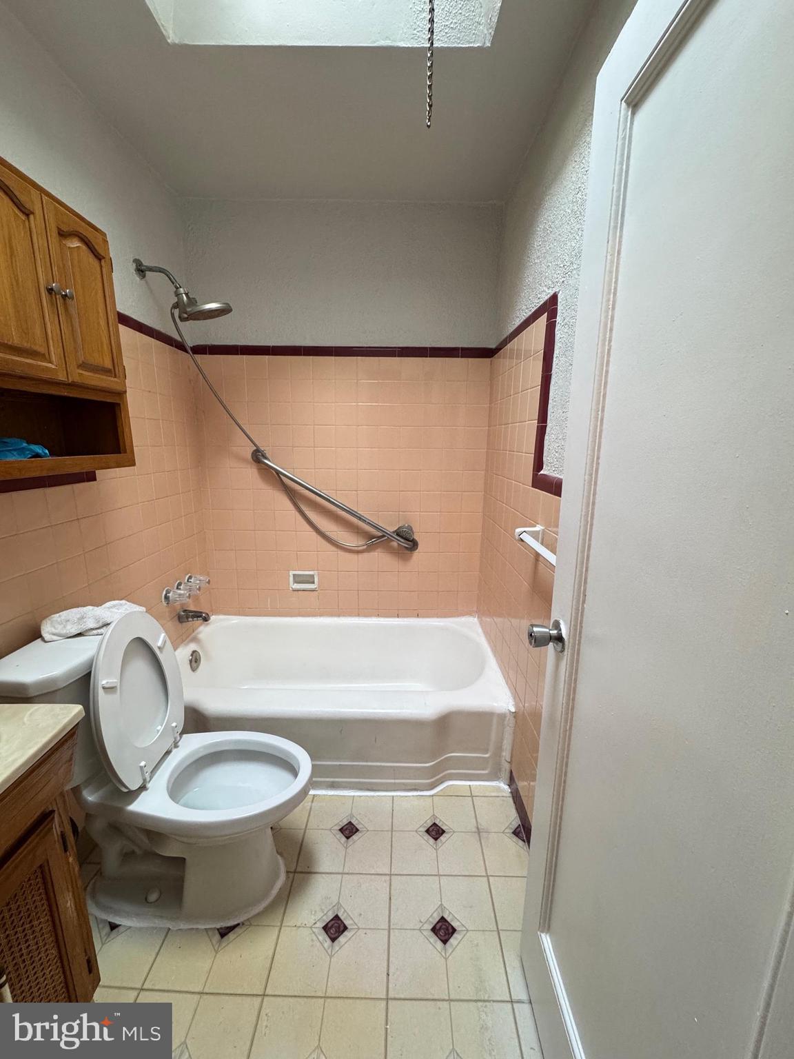 3255 Friendship Street Philadelphia, PA 19149 - Photo 4 of 11 a bathroom with a granite countertop toilet and a sink