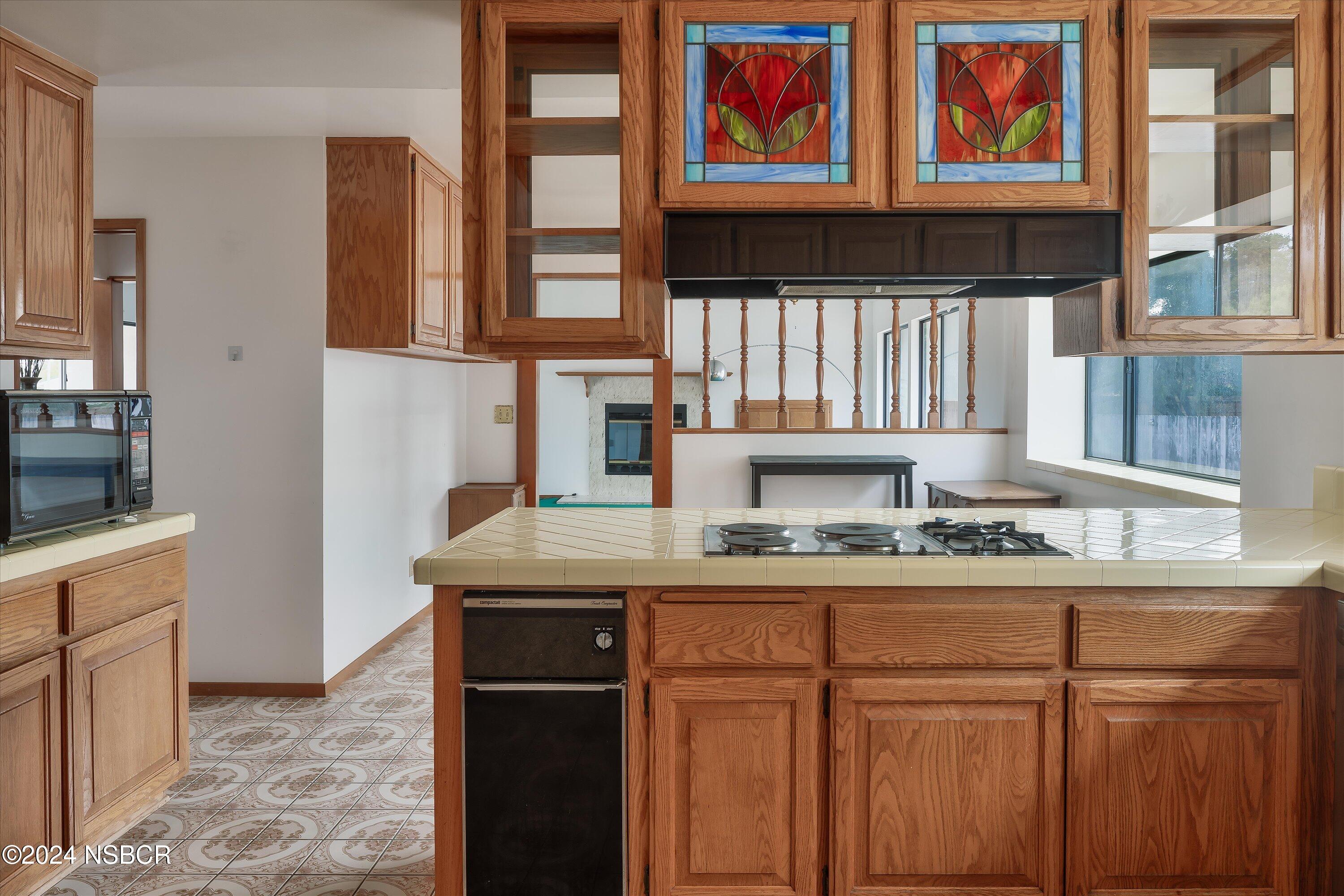 970 Onstott Road Lompoc, CA 93436 - Photo 12 of 38 a kitchen with cabinets and window