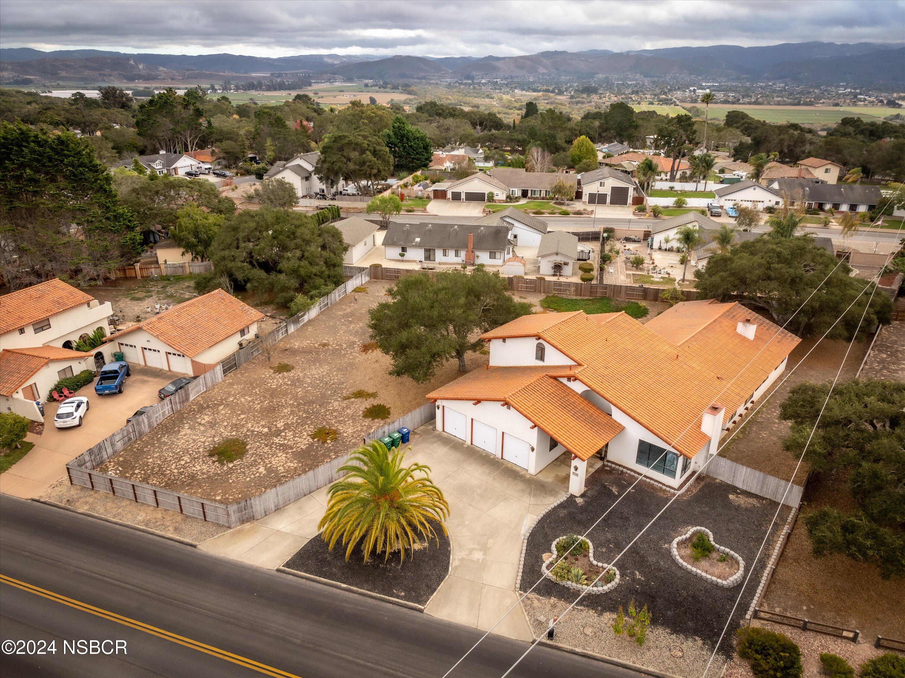 970 Onstott Road Lompoc, CA 93436 - Photo 35 of 38 an aerial view of residential houses with outdoor space