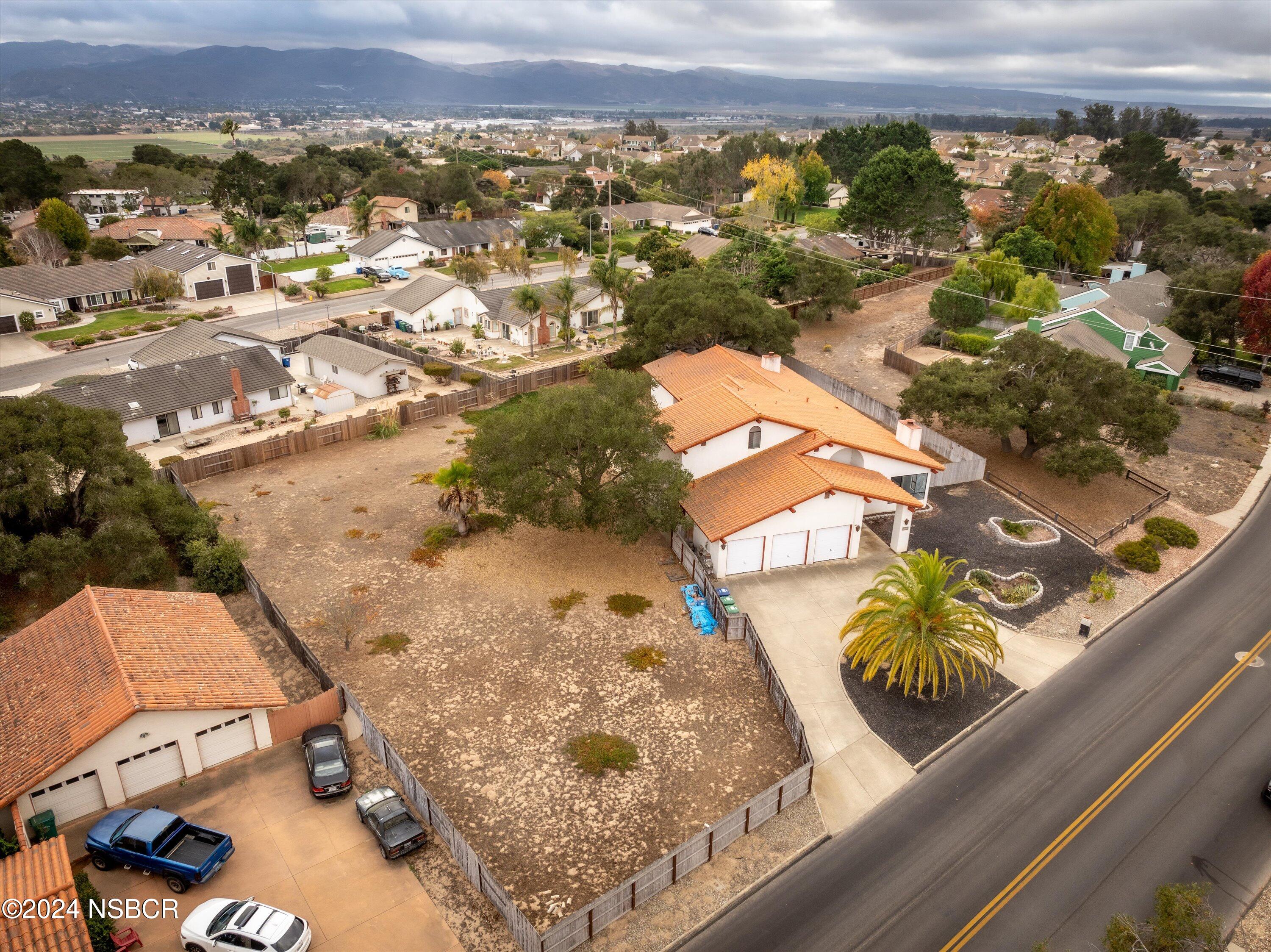 970 Onstott Road Lompoc, CA 93436 - Photo 36 of 38 an aerial view of residential houses with outdoor space