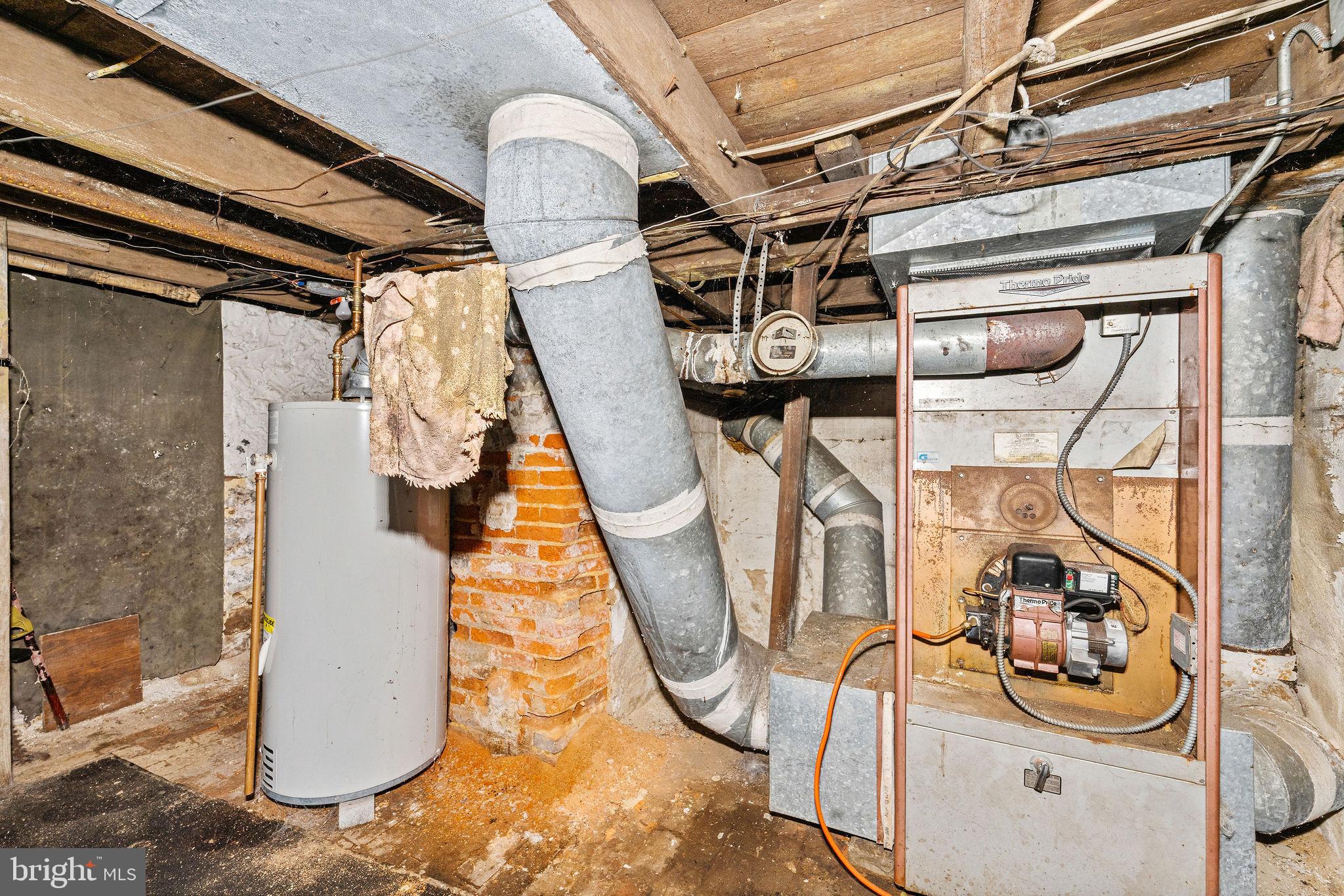 64 Walnut Street Bridgeton, NJ 08302 - Photo 23 of 26 a utility room with multiple dryer and washer