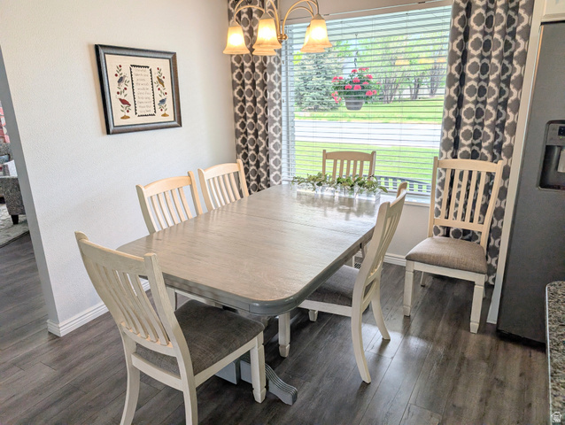 897 East 1200 North Mapleton, UT 84664 - Photo 9 of 54 Dining area with wood-style floors and a textured wall