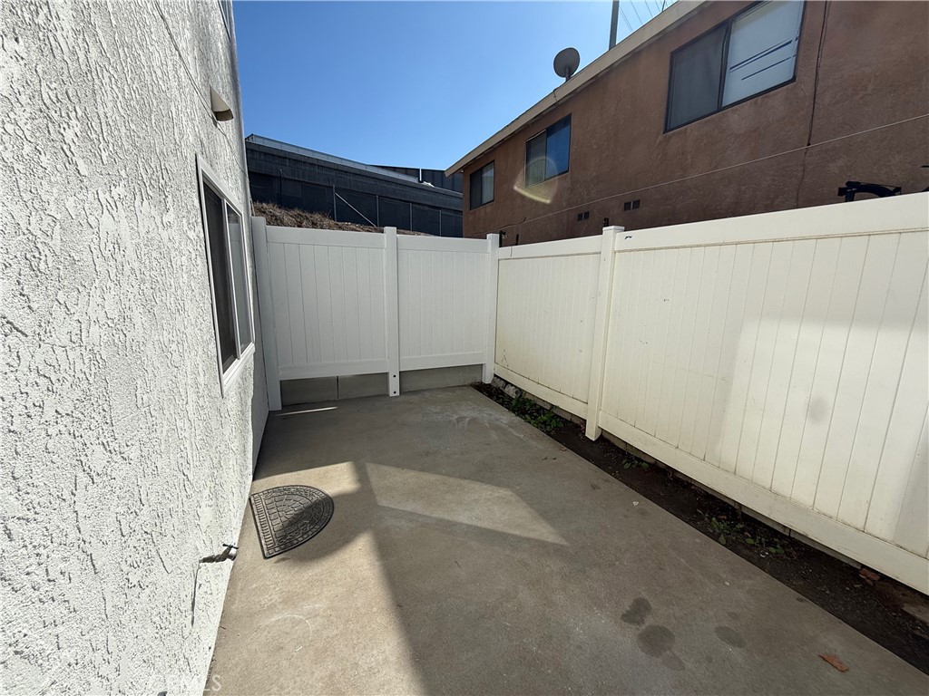 5010 Brooks Street, Unit 2 Riverside, CA 92506 - Photo 20 of 22 a view of a backyard