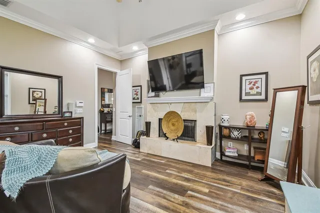 a view of a house with a yard and sitting area