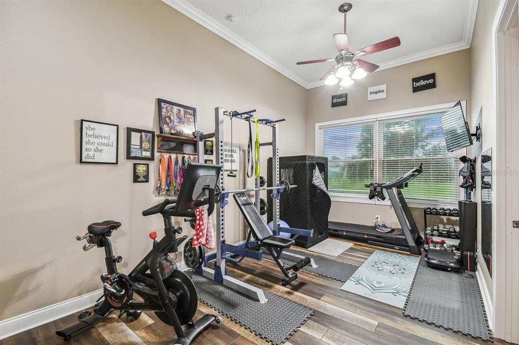 19315 Lake Pickett Road Orlando, FL 32820 - Photo 61 of 90 a view of a room with gym equipment