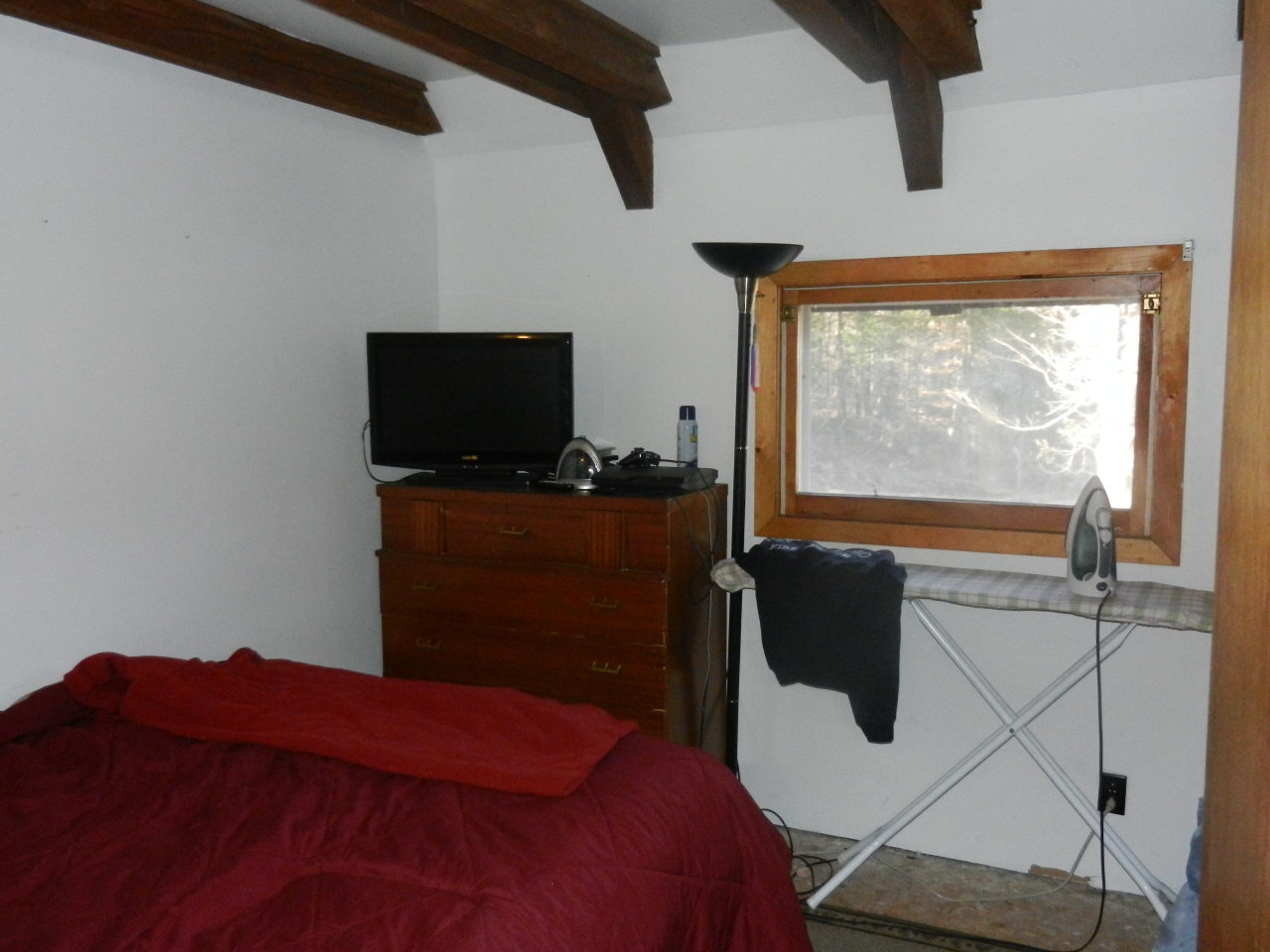 40 River Road Savoy, MA 01256 - Photo 3 of 25 a bedroom with a bed and large windows