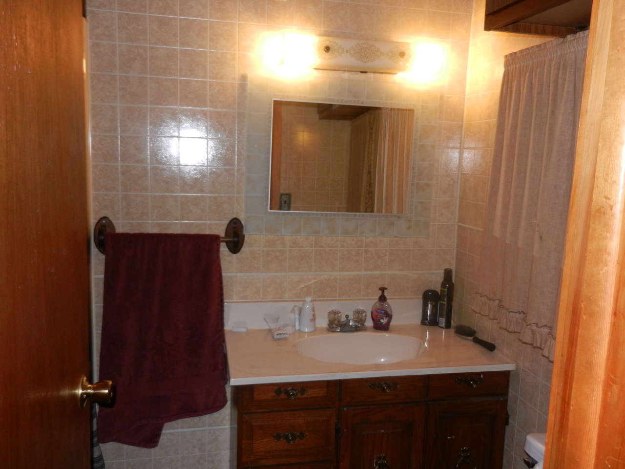40 River Road Savoy, MA 01256 - Photo 4 of 25 a bathroom with a sink and a mirror