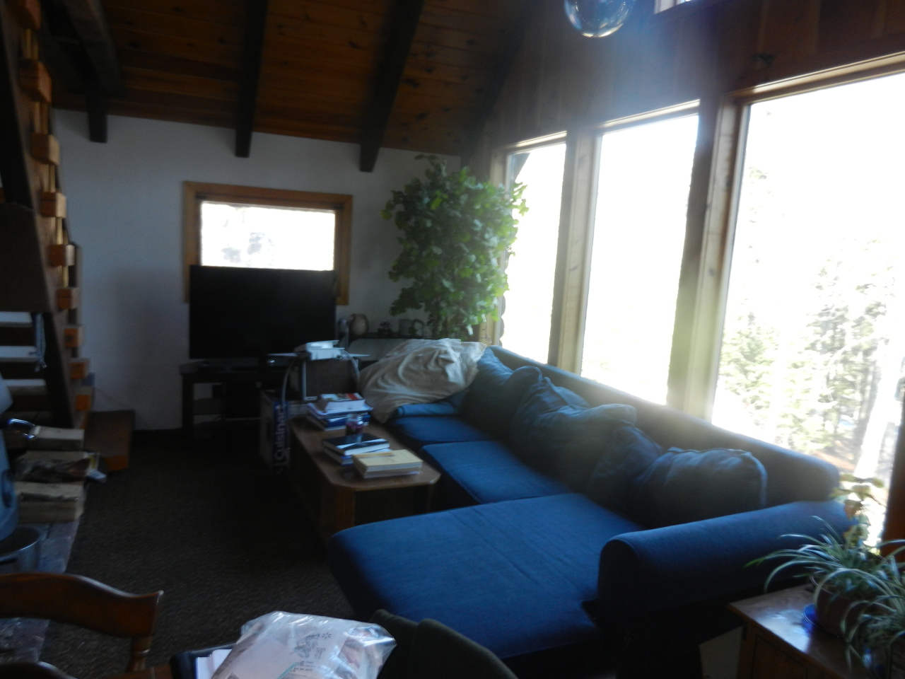 40 River Road Savoy, MA 01256 - Photo 8 of 25 a living room with furniture and a flat screen tv