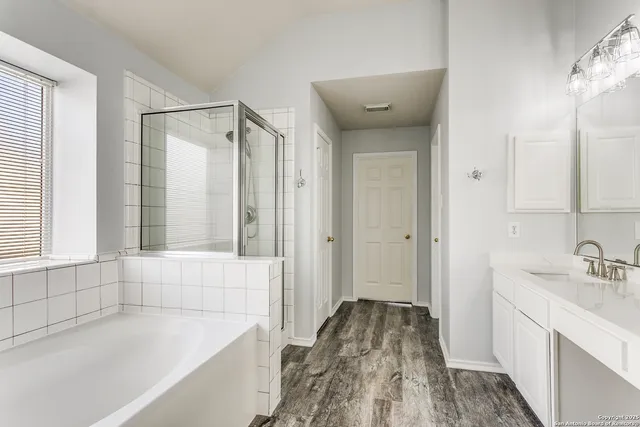 a bathroom with a sink and a bathtub