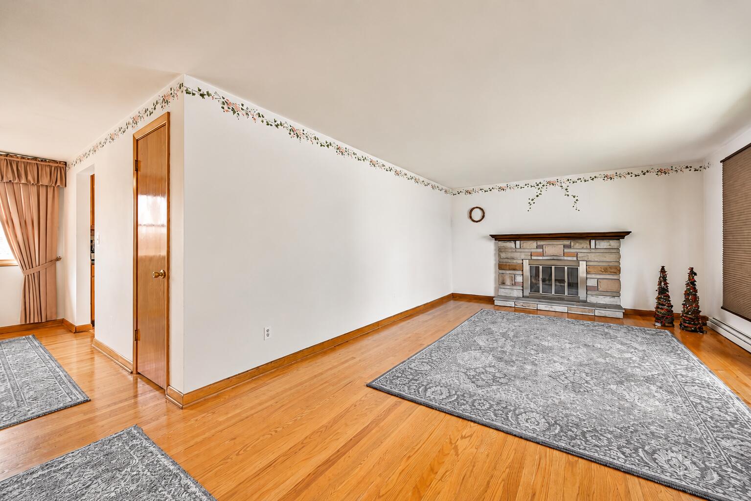 4428 Phoenix Drive Springfield, OH 45503 - Photo 6 of 35 Stone faced fireplace is the focal point in the room