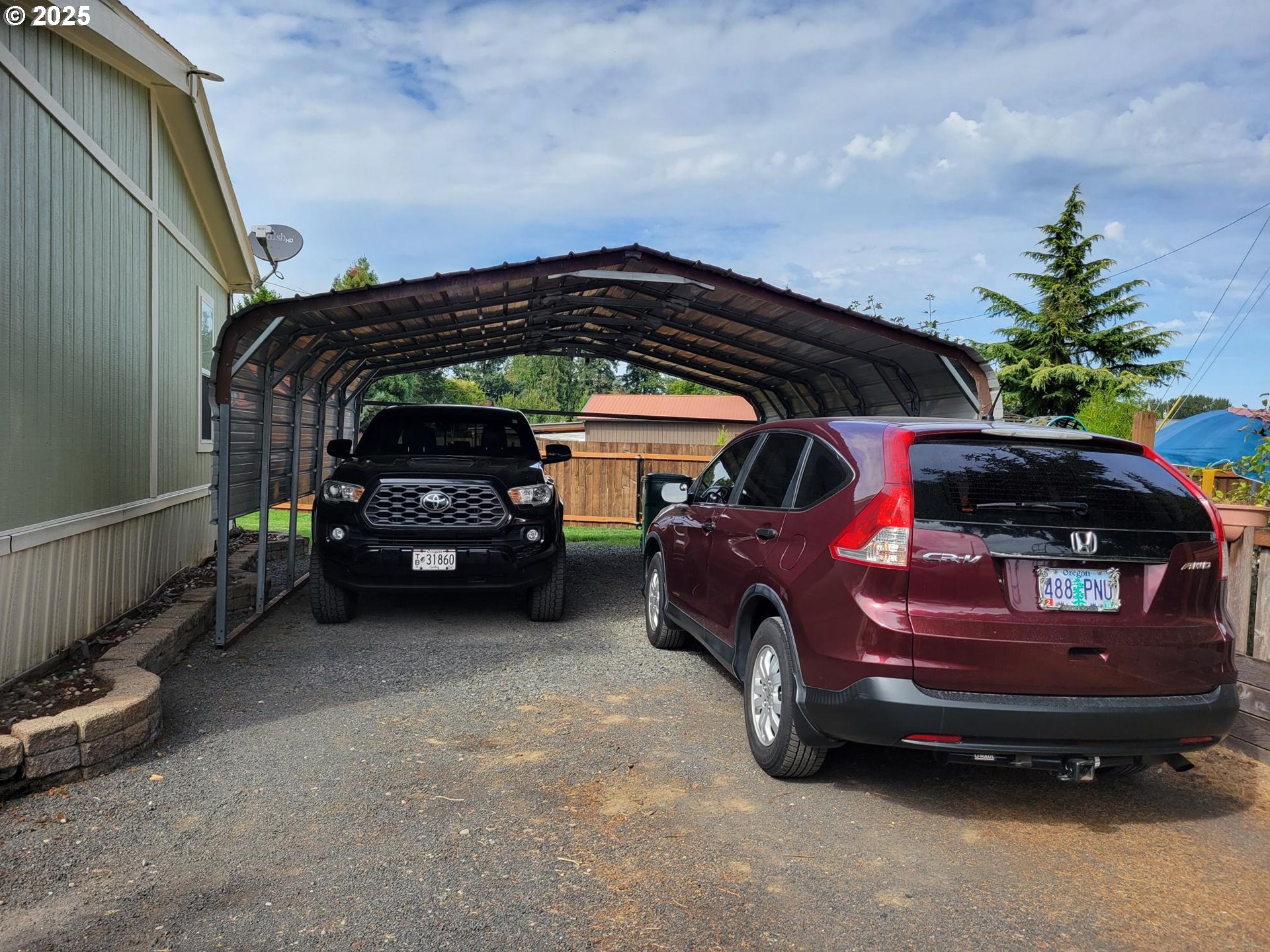 50551 Bark Way, Unit 47 Scappoose, OR 97056 - Photo 13 of 21 a view of a car in garage