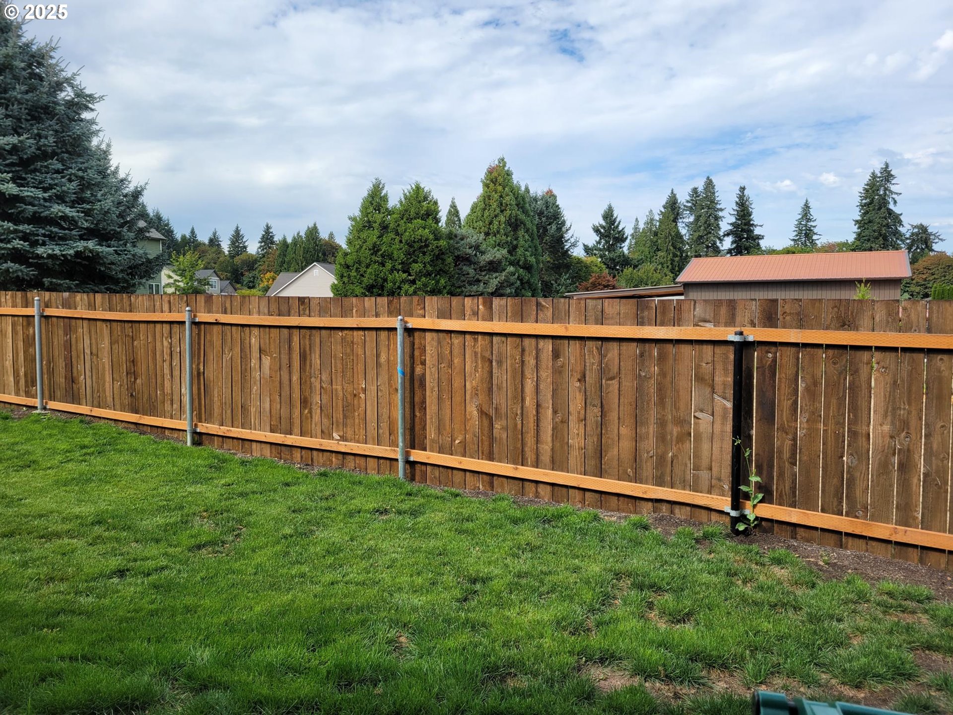 50551 Bark Way, Unit 47 Scappoose, OR 97056 - Photo 14 of 21 a view of a backyard with a garden