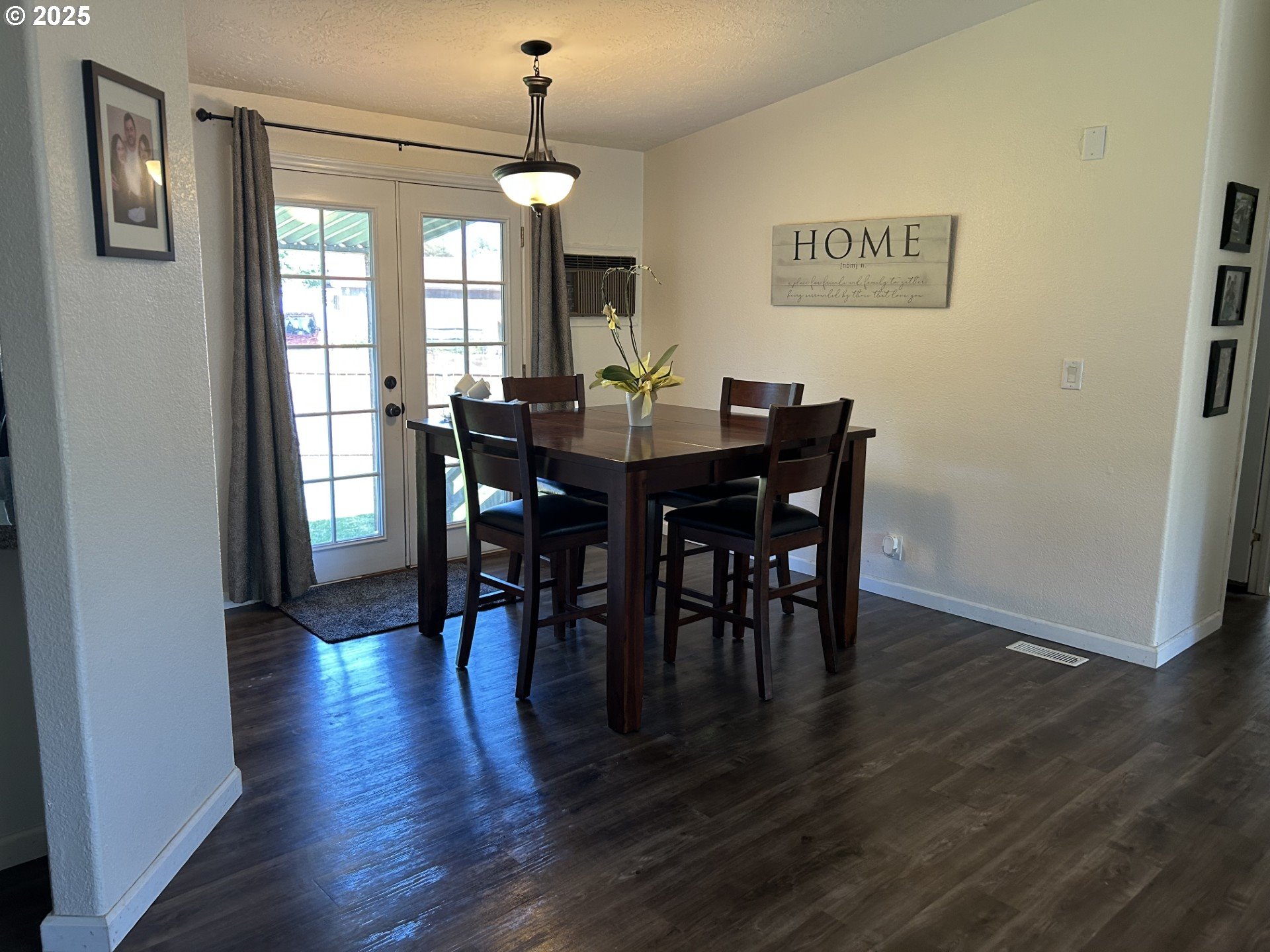 50551 Bark Way, Unit 47 Scappoose, OR 97056 - Photo 21 of 21 a view of a a dining room with furniture window and wooden floor