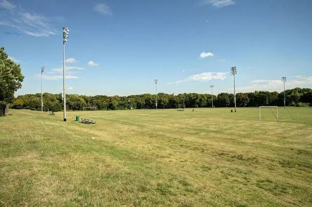 a view of a lake with a sitting area