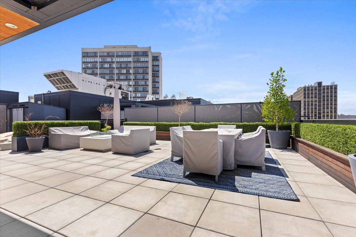 2773 North Hampden Court, Unit PH03 Chicago, IL 60614 - Photo 33 of 37 a view of roof deck with table and chairs