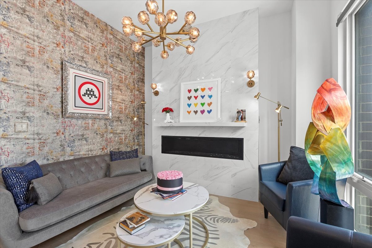 2773 North Hampden Court, Unit PH03 Chicago, IL 60614 - Photo 6 of 37 a living room with furniture and a fireplace