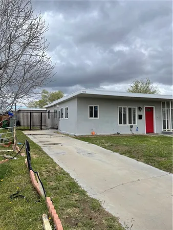 a house view with a backyard space
