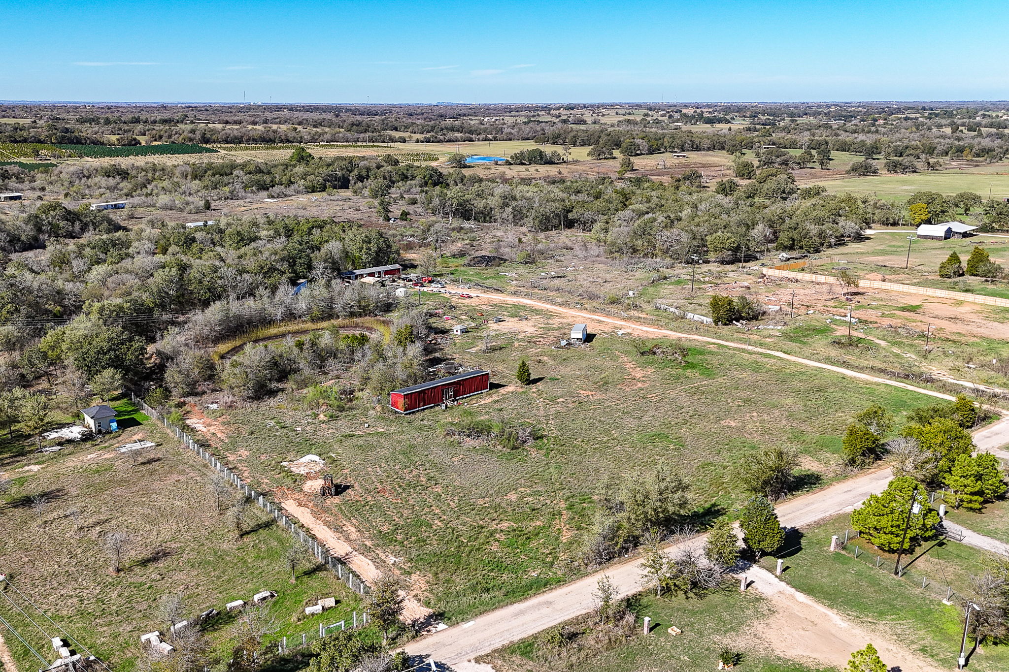 166 Norwood Lane Elgin, TX 78621 - Photo 12 of 22 an aerial view of residential houses with outdoor space