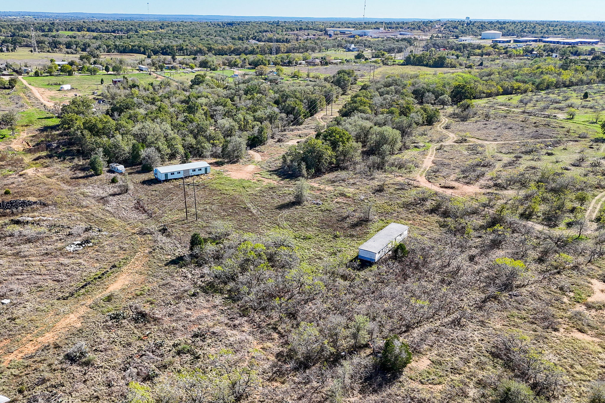 166 Norwood Lane Elgin, TX 78621 - Photo 20 of 22 an aerial view of houses with yard