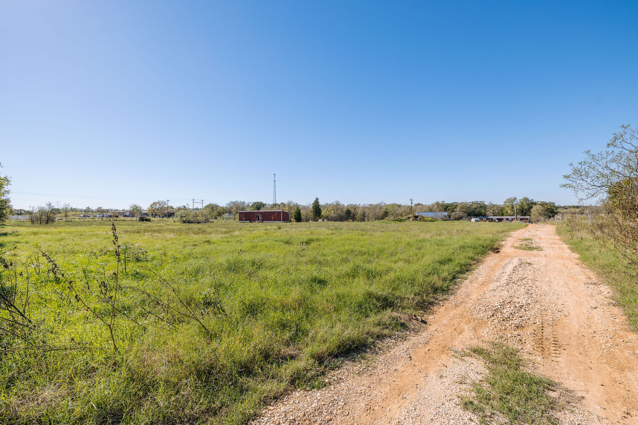 166 Norwood Lane Elgin, TX 78621 - Photo 22 of 22 a view of a lake with houses
