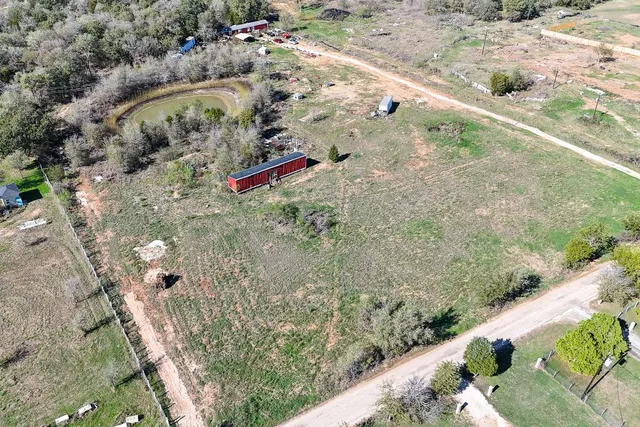 a view of a yard with an outdoor space