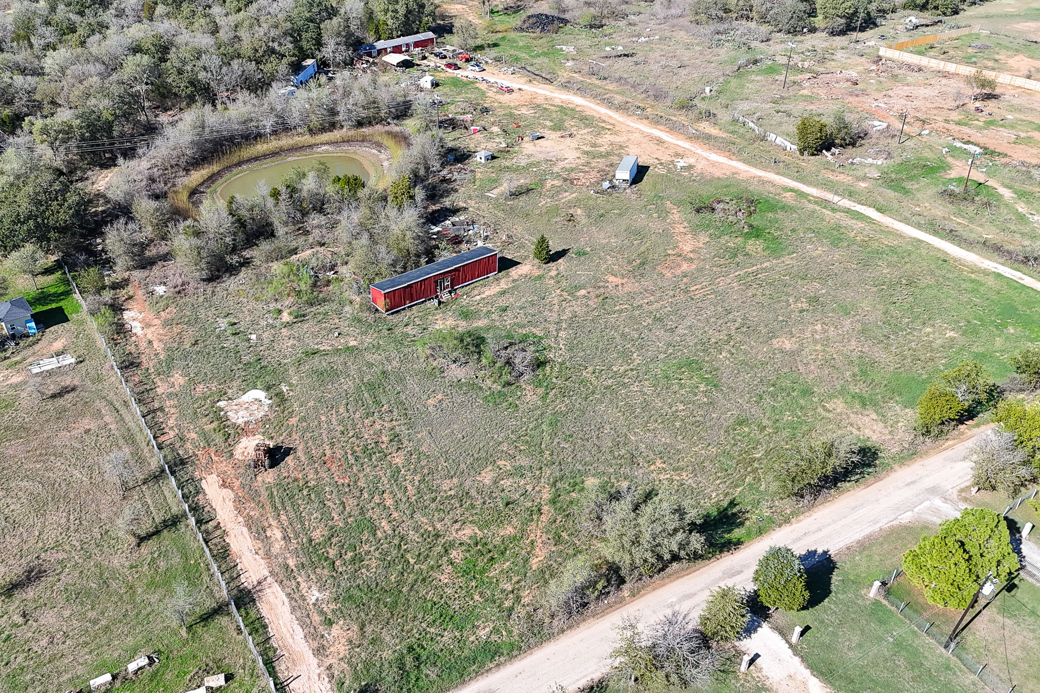 166 Norwood Lane Elgin, TX 78621 - Photo 3 of 22 a view of a yard with an outdoor space