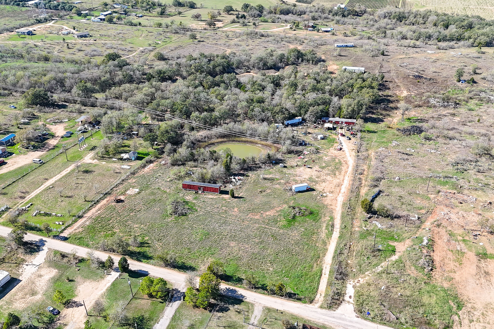 166 Norwood Lane Elgin, TX 78621 - Photo 6 of 22 an aerial view of residential houses with outdoor space