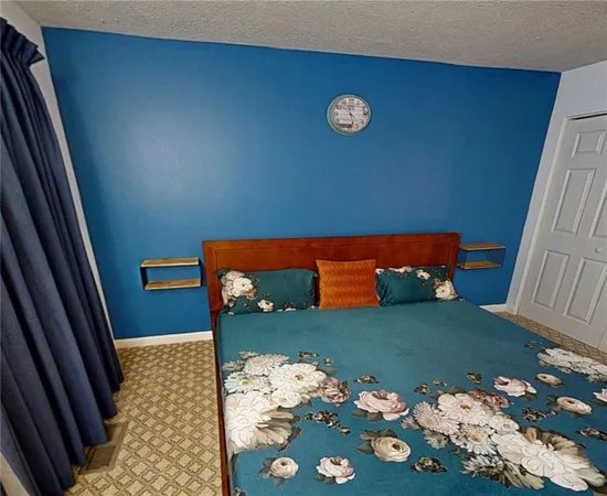 a room with furniture and a flat screen tv