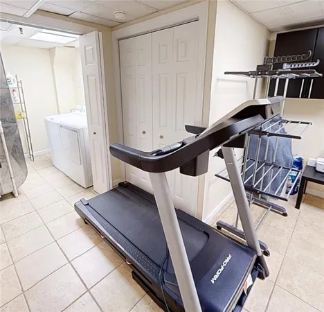 a utility room with washer and dryer