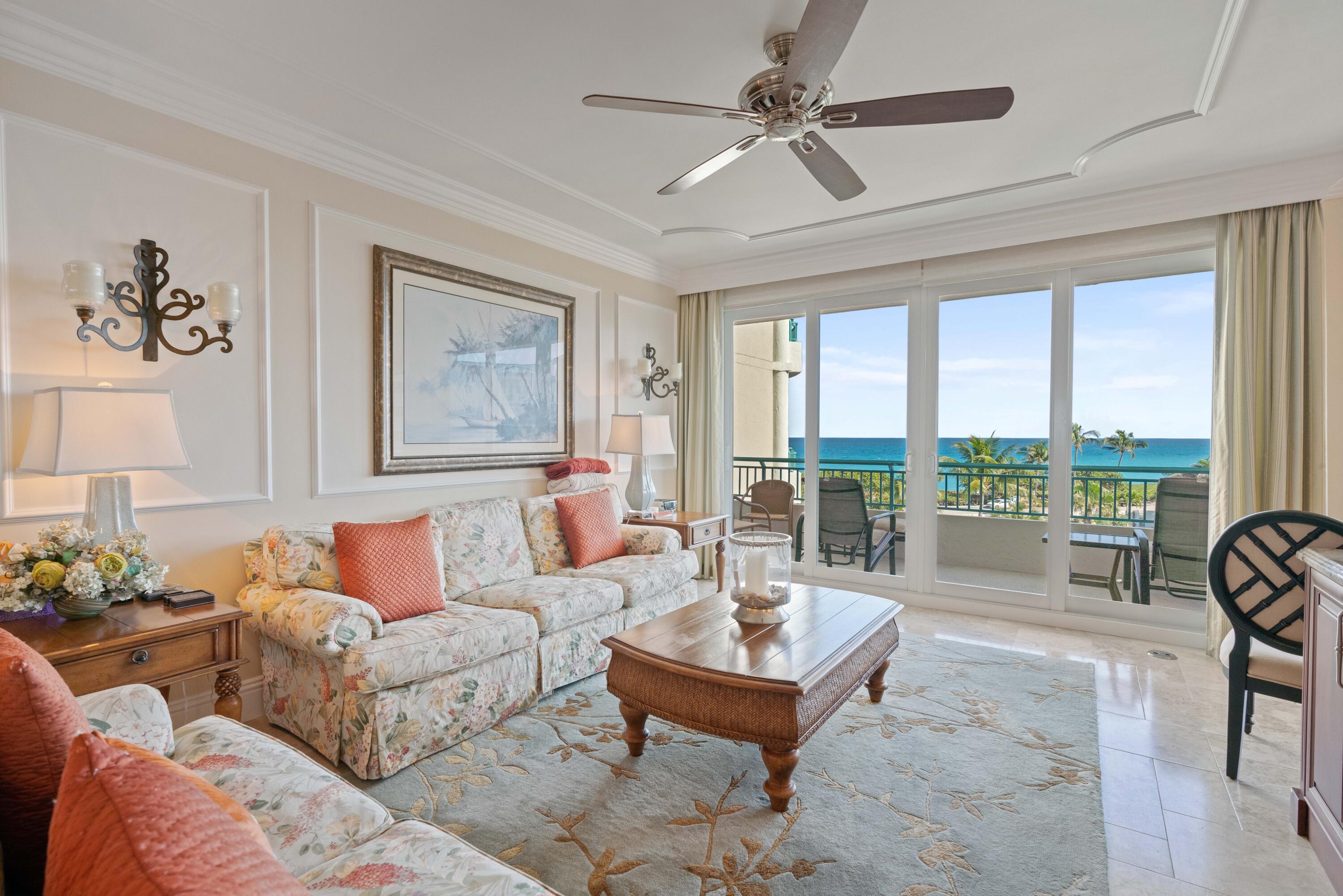 2000 Florida A1A, Unit 405 Jupiter, FL 33477 - Photo 12 of 39 a living room with furniture and a large window