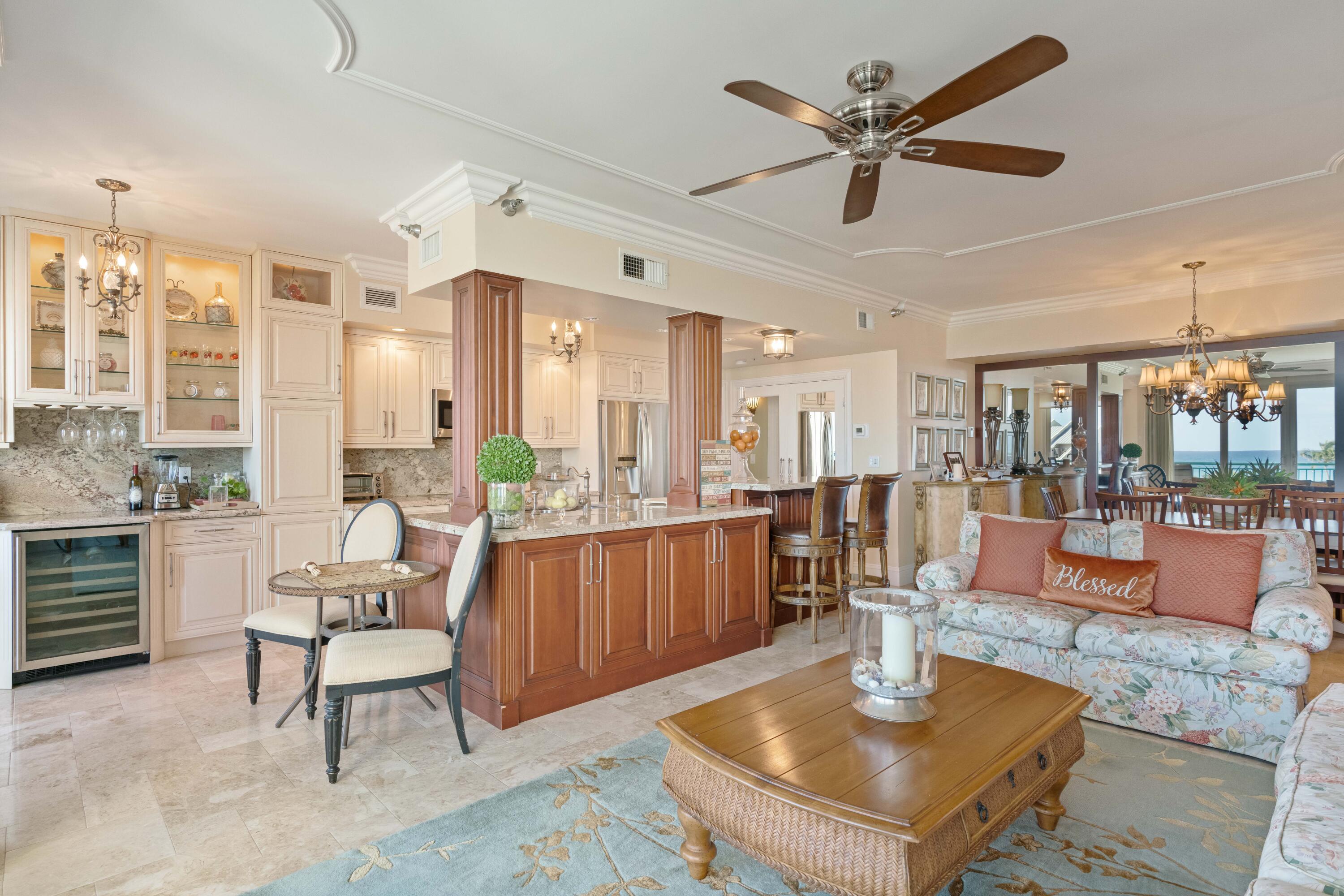 2000 Florida A1A, Unit 405 Jupiter, FL 33477 - Photo 15 of 39 a living room with furniture and a large window