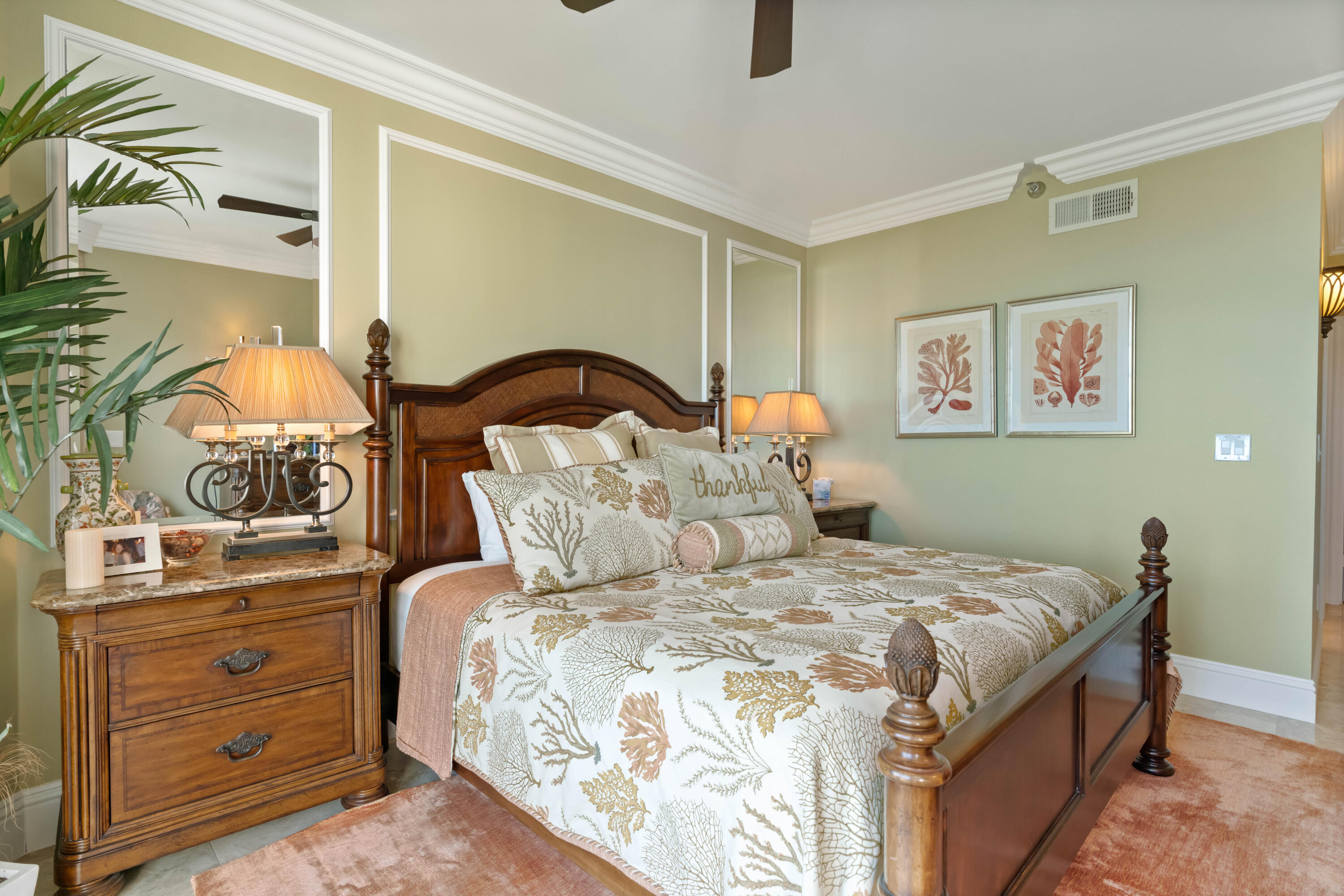 2000 Florida A1A, Unit 405 Jupiter, FL 33477 - Photo 17 of 39 a bedroom with a bed and a potted plant