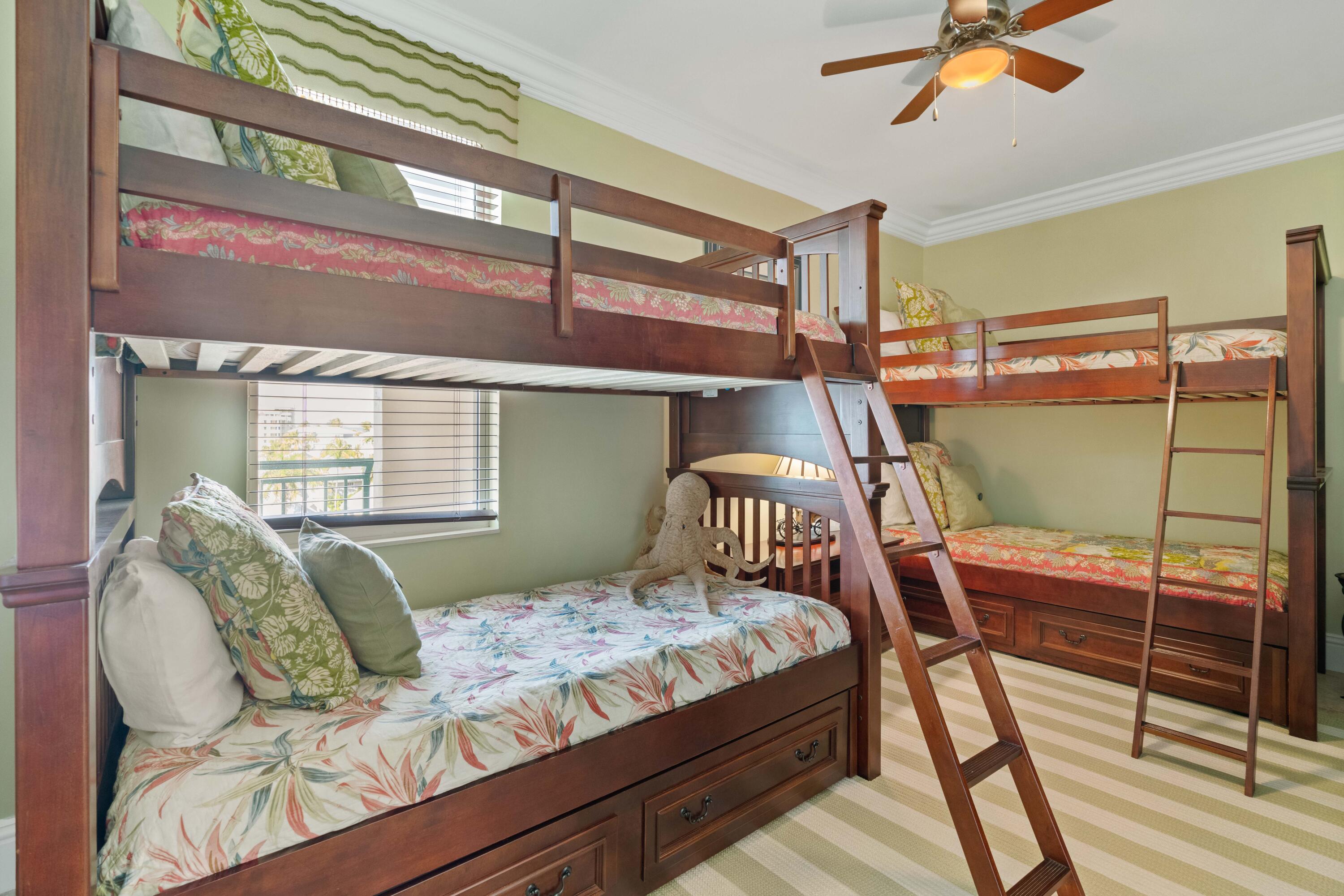 2000 Florida A1A, Unit 405 Jupiter, FL 33477 - Photo 22 of 39 a bedroom with a bed and window