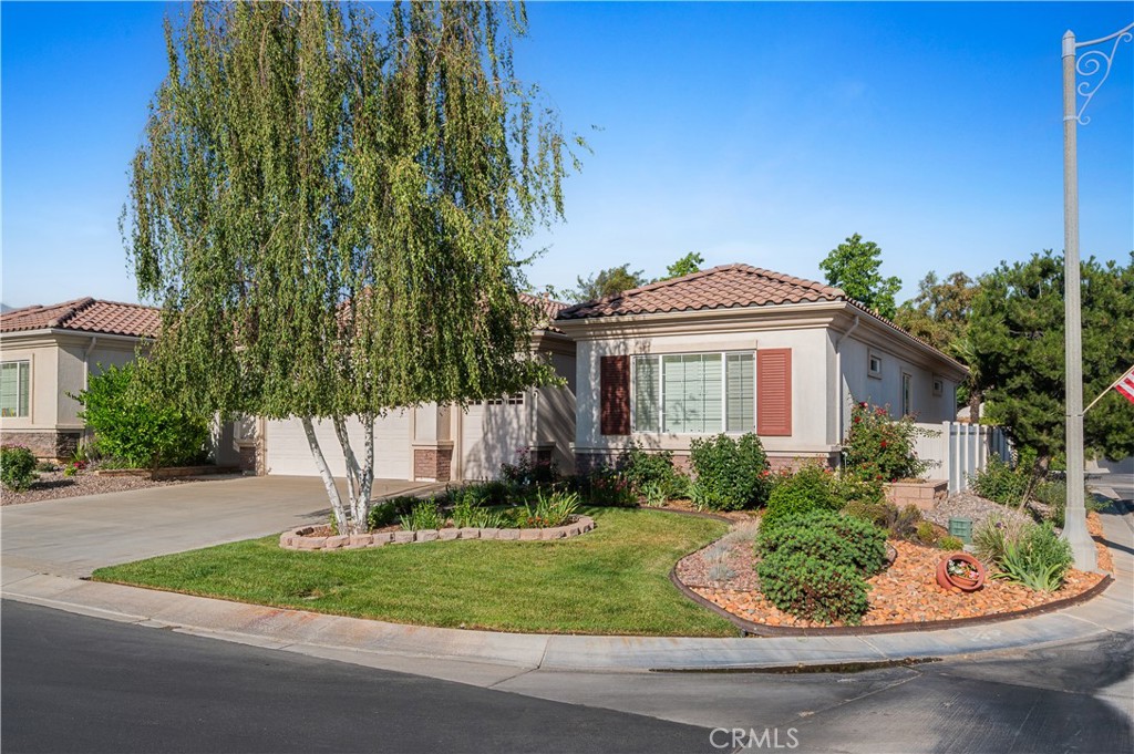 1706 Brittney Road Beaumont, CA 92223 - Photo 1 of 44 a front view of a house with a yard