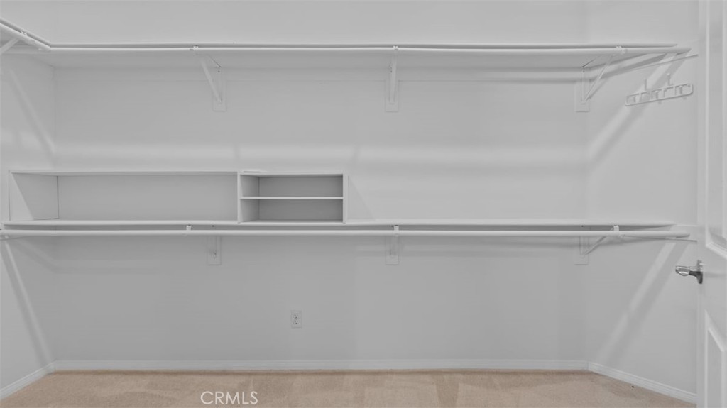 1706 Brittney Road Beaumont, CA 92223 - Photo 22 of 44 a view of an empty walk in closet