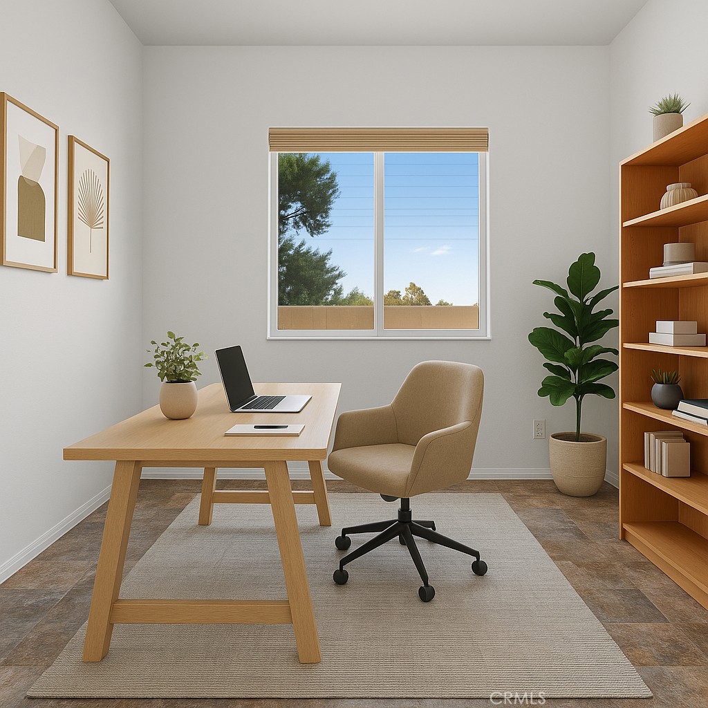 1706 Brittney Road Beaumont, CA 92223 - Photo 23 of 44 a workspace with furniture and a potted plant