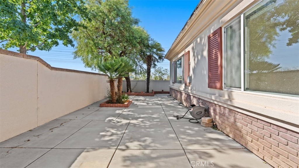 1706 Brittney Road Beaumont, CA 92223 - Photo 35 of 44 a view of a pathway with a house